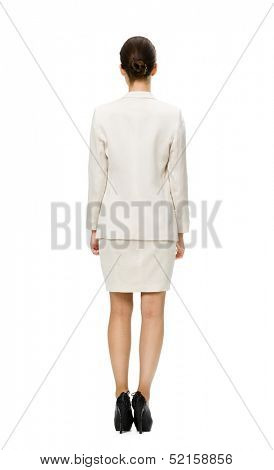 Full-length backview of businesswoman, isolated on white. Concept of leadership and success