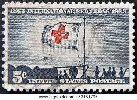Stock Photo:   United States - Circa 1943: Stamp Printed By United States, Shows Flag Of Red Cross