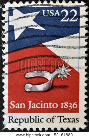 Stamp printed in USA shows spur star flag and the inscription 