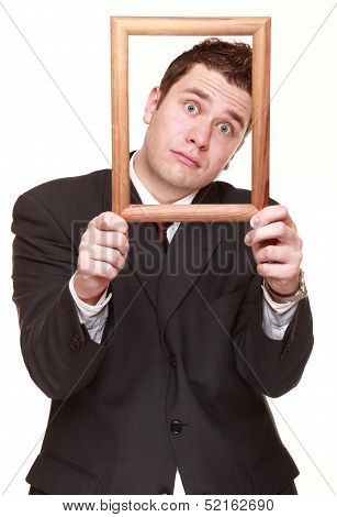 Business Man With Empty Frame Facial Expression