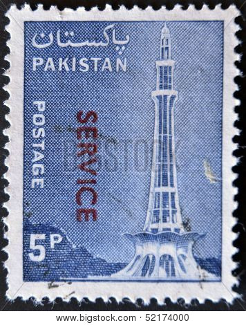 stamp printed in Pakistan shows Minar-e-Pakistan Tractor and Mausoleum of Ibrahim Khan Makli Tahtta