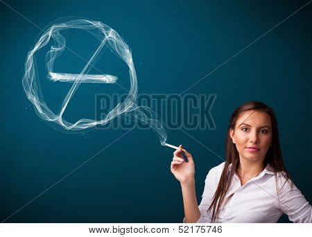 Pretty young lady smoking unheathy cigarette with no smoking sign