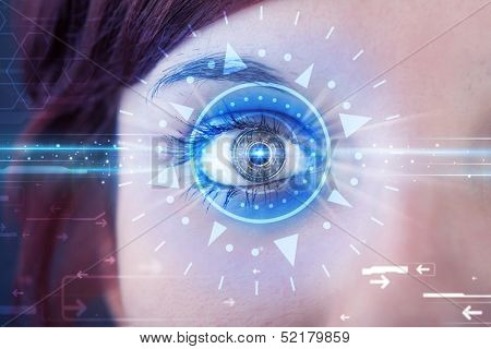 Modern cyber girl with technolgy eye looking into blue iris