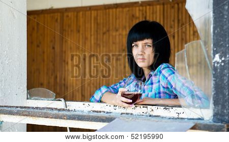 The young girl with a wine glass