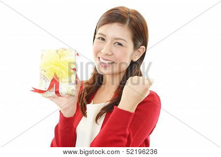 Smiling woman with a gift