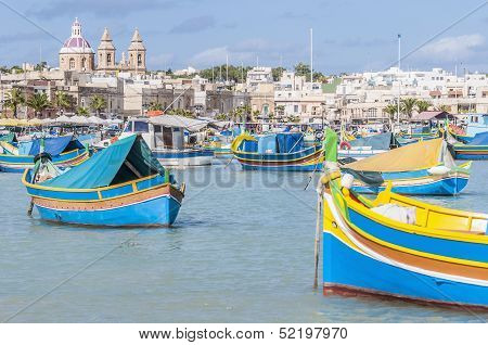 Harbor Of Marsaxlokk, A Fishing Village In Malta.