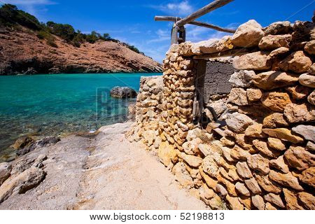 Ibiza Cala Moli beach with clear water in Balearic Islands San Jose