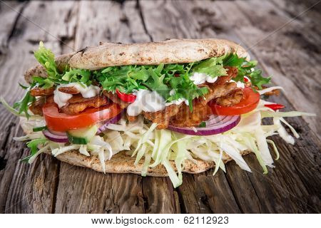 Doner Kebab - grilled meat, bread and vegetables