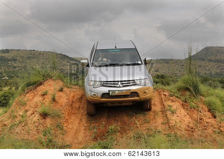 Silver Toyota Triton Dhd Crossing Obstacle