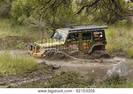 Gecko Pearl Green Jeep Wrangler Rubicon Crossing Muddy Pond