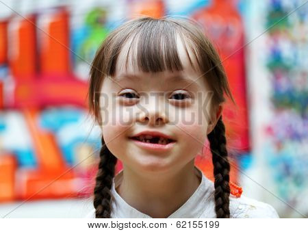 Portrait Of Beautiful Young Girl On The Playground.