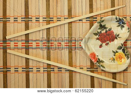 Chopsticks on a wicker mat