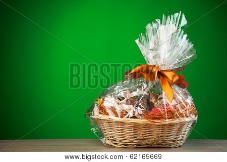 gift basket against green background