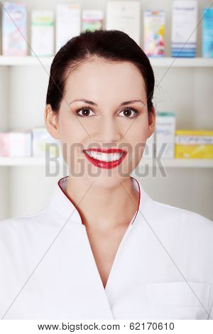 Beauty smiling woman in dru store.