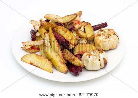 Oven Baked Potatoes, Beetroot, Celeriac And Garlic Bulbs