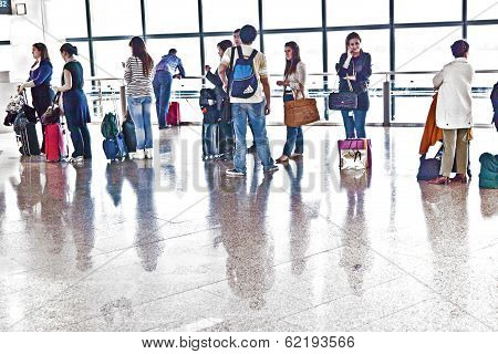 Passenger In Madrids Airport Barajas Are Waiting For The Delayed Flight