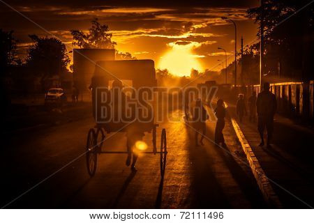Riding rickshaw at sunset