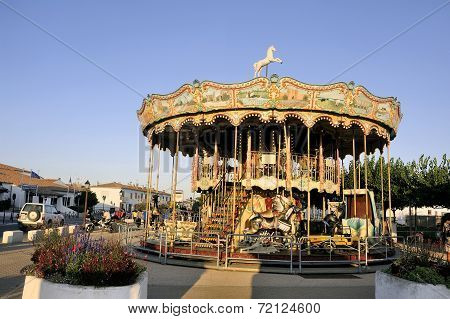 Carousel With Wooden Horses