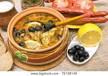 Dish Of Russian Hodgepodge Soup And Other Food.