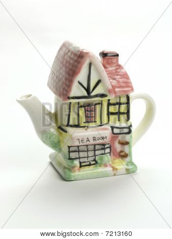 Ceramic teapot on white background