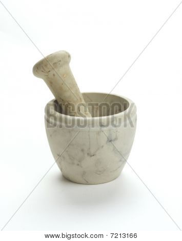 A mortar and pestle on white background