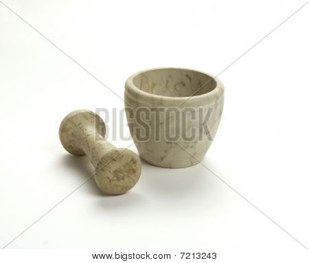 A mortar and pestle on white background