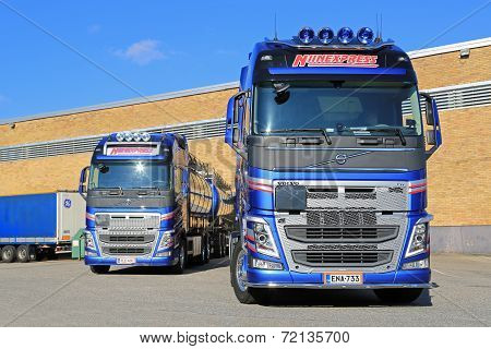 Two New Volvo FH Tank Trucks By A Warehouse