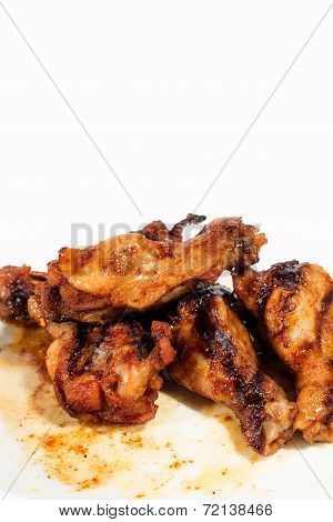 Grilled chicken wings isolated on white background