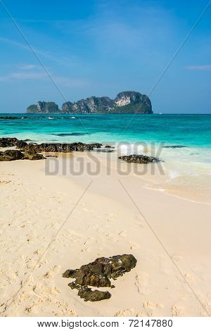 Blue sky and white sand at Bamboo Island, Thailand
