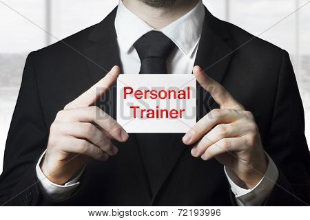 Businessman Holding Sign Personal Trainer