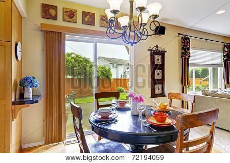 Dining Area With Exit To Backyard Patio