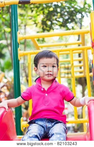 Asian Boy Relax In The Park