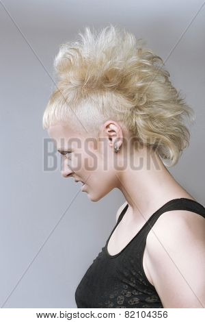 angry aggressive girl in black lenses.