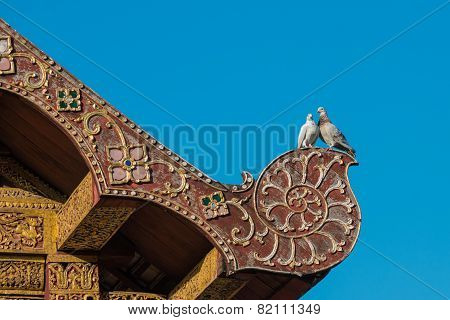 Two Lover Pigeon On The Ancient Thai Art Style Roof