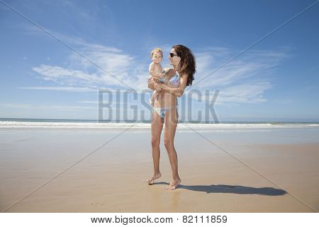Bikini Mum With Baby At Beach