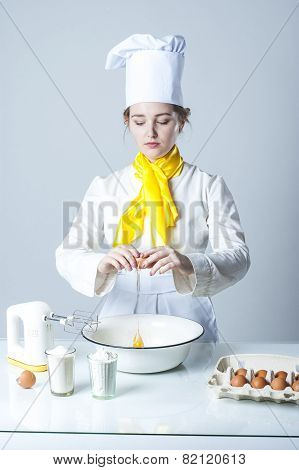 Cook Breaking Egg