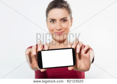 Young woman show display of mobile cell phone