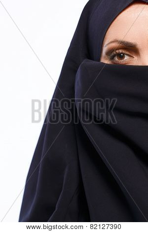 Beautiful Muslim woman looking at camera