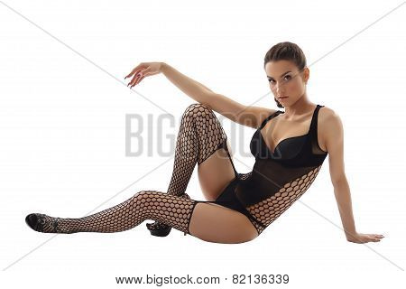 Beddable brunette in lingerie and stockings