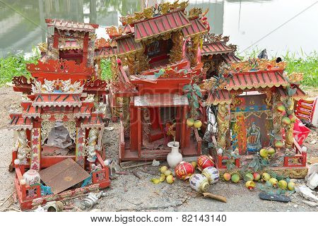 Chinese Shrine That Was Left By The Side Of The Canal .