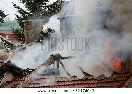 Firefighters Burning House