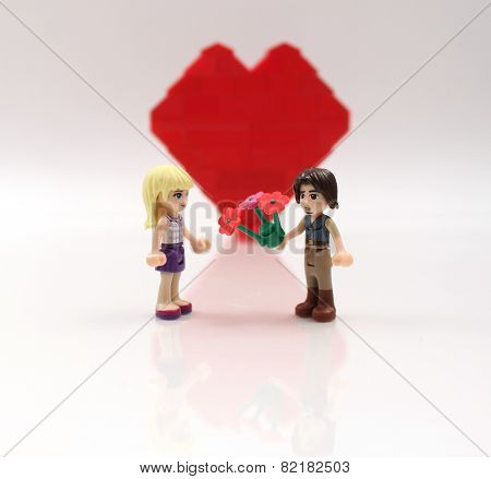 Boy Giving Girl Flowers