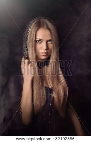 Halloween concept: young and sexy witch