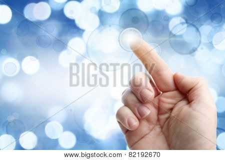 Finger tapping button on touchscreen