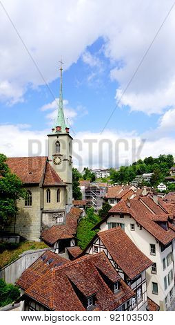 Historical Old Town City And Church On Bridge