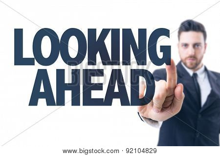 Business man pointing the text: Looking Ahead