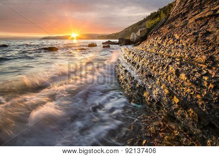rocky Adriatic coast, in the light of the rising sun