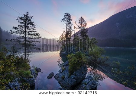 Alpine lake,Sunrise over the alpine lake Laghi di Fusine