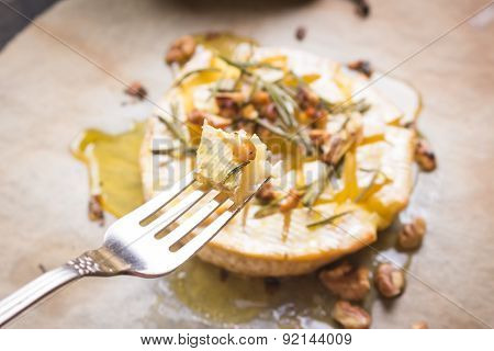 Delicious Baked Camembert With Honey, Walnuts, Herbs And Pears