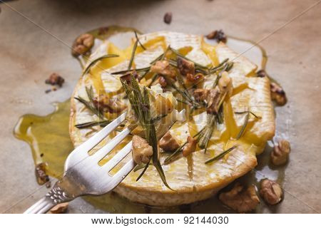 Delicious Baked Camembert With Honey, Walnuts, Herbs And Pears